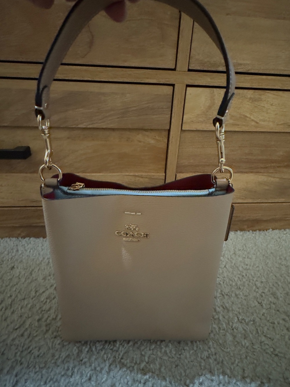 Coach Beige Pebbled Leather Crossbody Bag with Red Interior